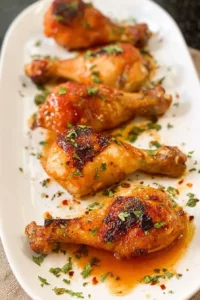 Crispy hot honey chicken drumsticks with caramelized glaze